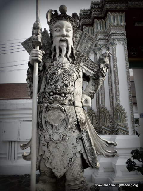 Giant stone guardian at Wat Po
